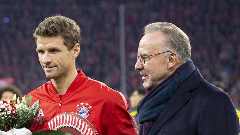 Thomas Müller (links) und Karl-Heinz Rummenigge sind bei Lionel Messi unterschiedlicher Meinung.