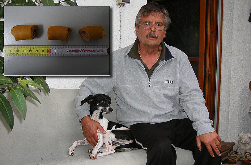 Bernd Bölderl mit seinem kleinen Liebling &bdquo;Gremmy&ldquo;. Sie hatte eins der ausgelegten Gift-Würstchen (oben links) gefressen und musste notoperiert werden.