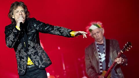 Rockten München: Mick Jagger (li.) und die Rolling Stones. Die Bilder vom Mega-Konzert aus dem Olympiastadion zum Durchklicken.