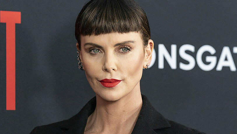 Dass Charlize Theron Fotos von ihrer Familie zeigt, ist äußerst selten. Dass Charlize Theron Fotos von ihrer Familie zeigt, ist äußerst selten.