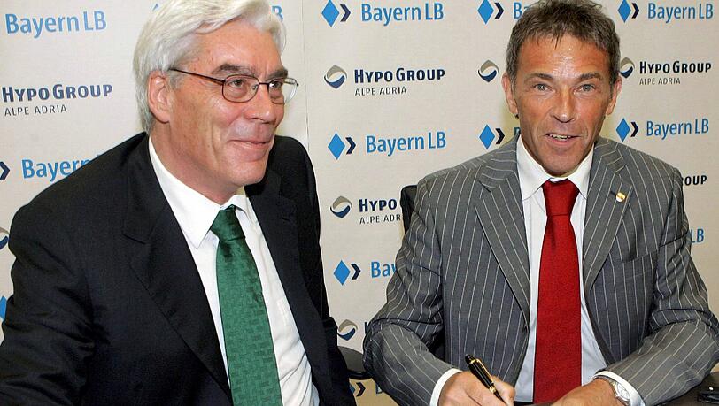 Ging da alles mit rechten Dingen zu? Der Vorstandsvorsitzende der BayernLB, Werner Schmidt (l) und der Landeshauptmann von Kärnten, Jörg Haider unterzeichneten am 21.05.2007 den Vertrag zur Übernahme der Hypo Alpe Adria durch die BayernLB in Klagenfurt. Ging da alles mit rechten Dingen zu? Der Vorstandsvorsitzende der BayernLB, Werner Schmidt (l) und der Landeshauptmann von Kärnten, Jörg Haider unterzeichneten am 21.05.2007 den Vertrag zur Übernahme der Hypo Alpe Adria durch die BayernLB in Klagenfurt.