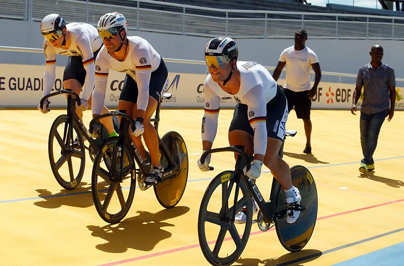 Das Sprint-Team mit Robert Förstemann (r), Eric Engler und Joachim Eilers fuhr Open Air zu Gold. Foto: Roberto Bettini