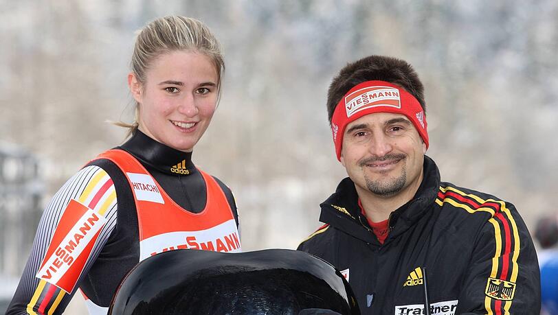 Natalie Geisenberger und Georg Hackl.