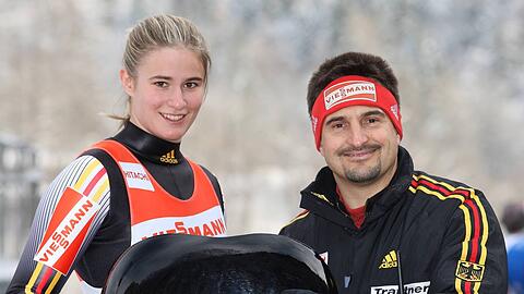 Natalie Geisenberger und Georg Hackl.