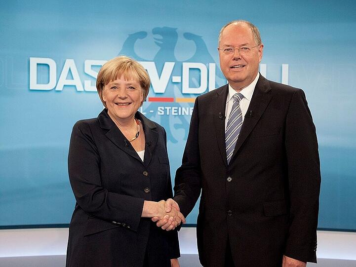 Die Parteispitzenkandidaten Angela Merkel (CDU) und Peer Steinbrück (SPD)