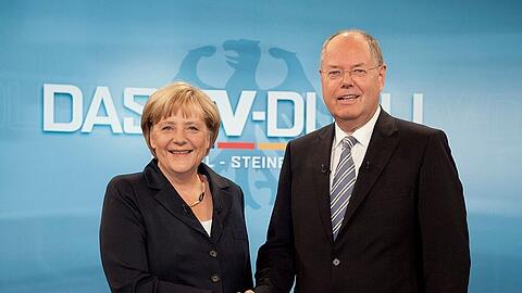 Die Parteispitzenkandidaten Angela Merkel (CDU) und Peer Steinbrück (SPD)