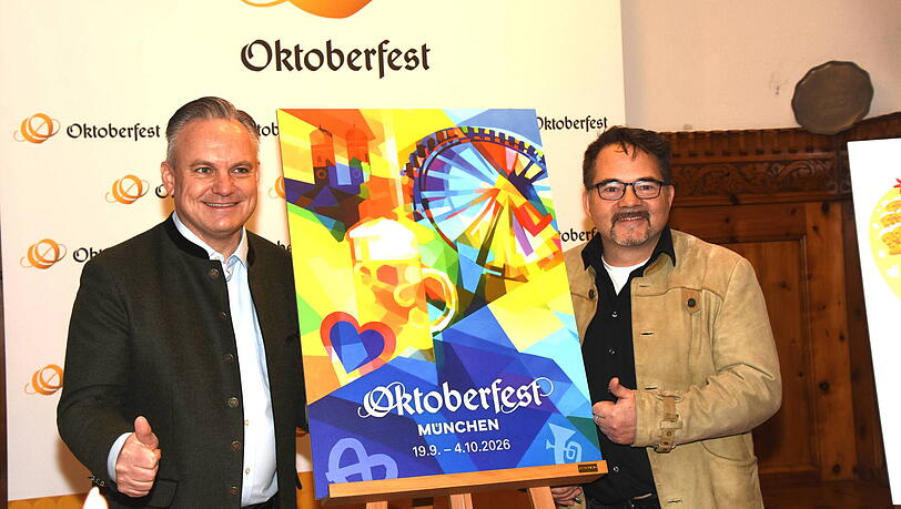 Wiesn-Chef Christian Scharpf (SPD) zusammen mit dem Sieger Florian Huber bei der offiziellen Pr&auml;sentation des neuen Plakats f&uuml;r das Oktoberfest 2026.