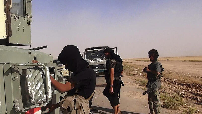 Kämpfer der Terrormiliz Islamischer Staat haben in Dair as-Saur mindestens 135 Menschen getötet. (Archivfoto) Kämpfer der Terrormiliz Islamischer Staat haben in Dair as-Saur mindestens 135 Menschen getötet. (Archivfoto)