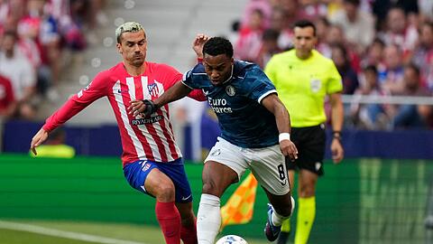 Antoine Griezmann (l) sorgte gegen Feyenoord für den Ausgleich für Atlético Madrid.
