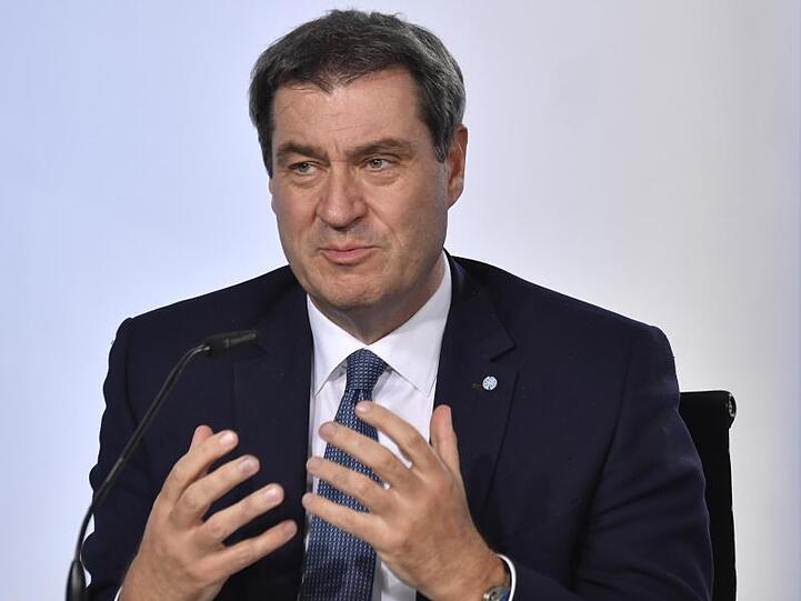 Markus Söder, Ministerpräsident von Bayern, spricht bei einer Pressekonferenz. Foto: John Macdougall/AFP/POOL/dpa