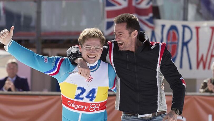 "Eddie the Eagle - Alles ist möglich": Eddie Edwards (Taron Egerton, l.) mit seinem Trainer Bronson Peary (Hugh Jackman).