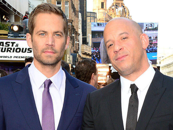 Paul Walker (l.) und Vin Diesel bei der Weltpremiere von "Fast & Furious 6" in London im Mai 2013 - im November 2013 verunglückte Walker tödlich
