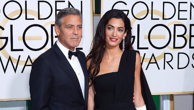 George Clooney und Amal George Clooney und Amal