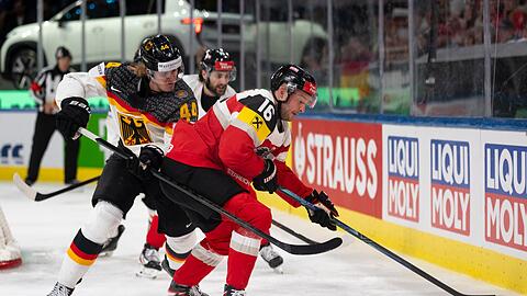 Deutschland und &Ouml;sterreich lieferten sich ein physisches Spiel bei der Eishockey-WM.