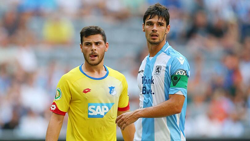 Das letzte Duell gab es, als Huddersfields Christopher Schindler (r.) noch Löwe war und Leverkusens Stürmer Kevin Volland bei der TSG 1899 Hoffenheim kickte. Jetzt drückten beide den Sechzgern im Relegationsrückspiel gegen den 1. FC Saarbrücken von der Tribüne aus die Daumen.