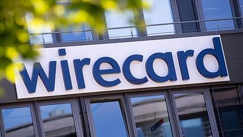 Der Schriftzug von Wirecard ist an der Firmenzentrale zu sehen. Foto: Sven Hoppe/dpa/Symbolbild