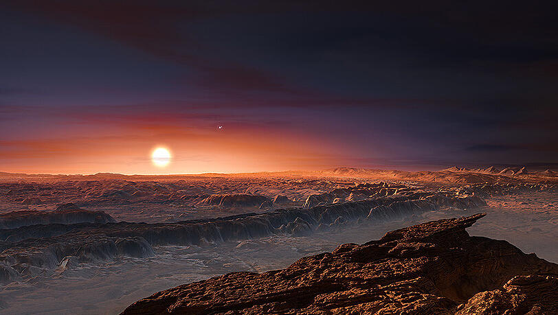 Ein Traum in Rot: So stellt sich ein Künstler die Oberfläche des Planeten „Proxima Centauri b“ vor. Ein Traum in Rot: So stellt sich ein Künstler die Oberfläche des Planeten „Proxima Centauri b“ vor.