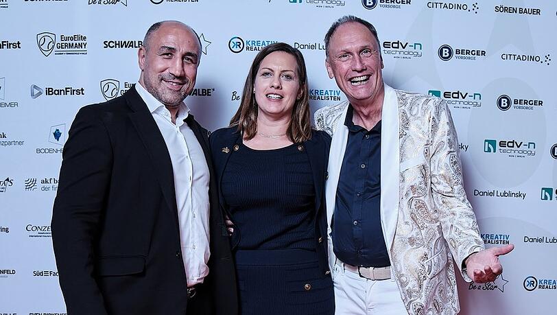 Arthur Abraham (li.) mit GfK-Leiterin Innovation, Start Up & Investment, Christina Paap, und GfK-Gründer Winfried Vogt.