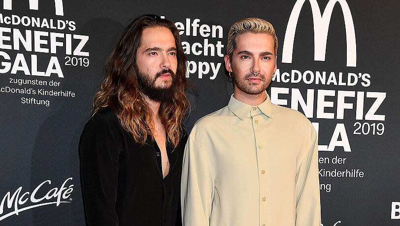 Tom (l.) und Bill Kaulitz auf einer Benefizgala in München Tom (l.) und Bill Kaulitz auf einer Benefizgala in München