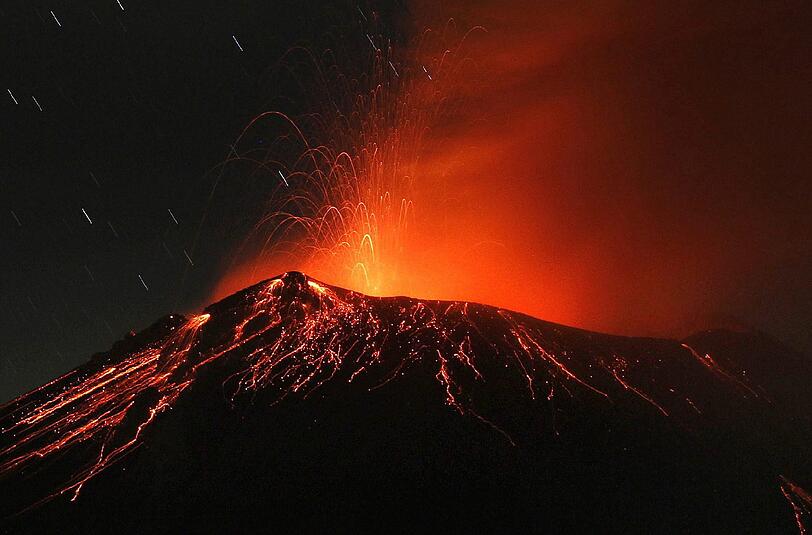 Blick von dem mexikanischen Dorf Xalitzintla auf den Vulkan Popocatépetl. 11 000 Menschen leben unmittelbarer Nähe des Vulkans.