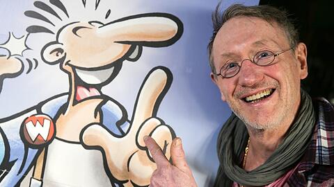 Der Comiczeichner Rötger Feldmann alias Brösel mit seiner Figur Werner.