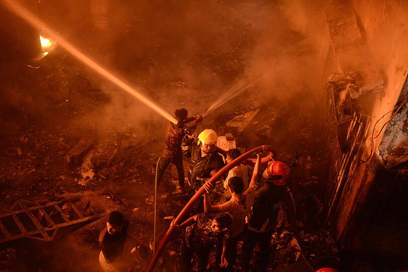 Bei dem Großbrand wurden mehrere Dutzend Menschen getötet.