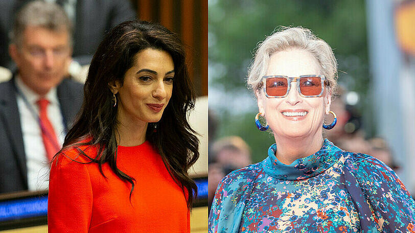 Menschenrechtsanwältin Amal Clooney (l.) bekommt den Freiheitspreis von Hollywood-Star Meryl Streep überreicht.