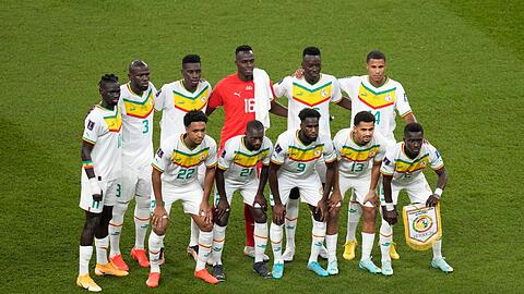 Senegals Nationalspieler posieren für ein Teamfoto.