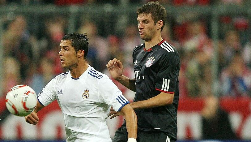 Im Duell mit Cristiano Ronaldo: Thomas Müller vom FC Bayern Im Duell mit Cristiano Ronaldo: Thomas Müller vom FC Bayern