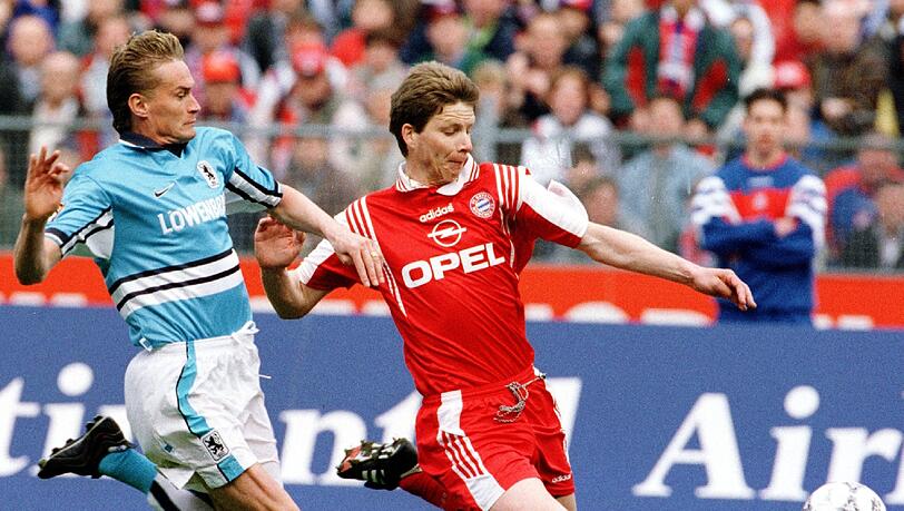 Manfred Bender vom TSV 1860 München (l) kämpft am 11. April 1998 mit Michael Tarnat vom FC Bayern München um den Ball. Es war das 187. Münchner Bundesliga-Derby. Manfred Bender vom TSV 1860 München (l) kämpft am 11. April 1998 mit Michael Tarnat vom FC Bayern München um den Ball. Es war das 187. Münchner Bundesliga-Derby.