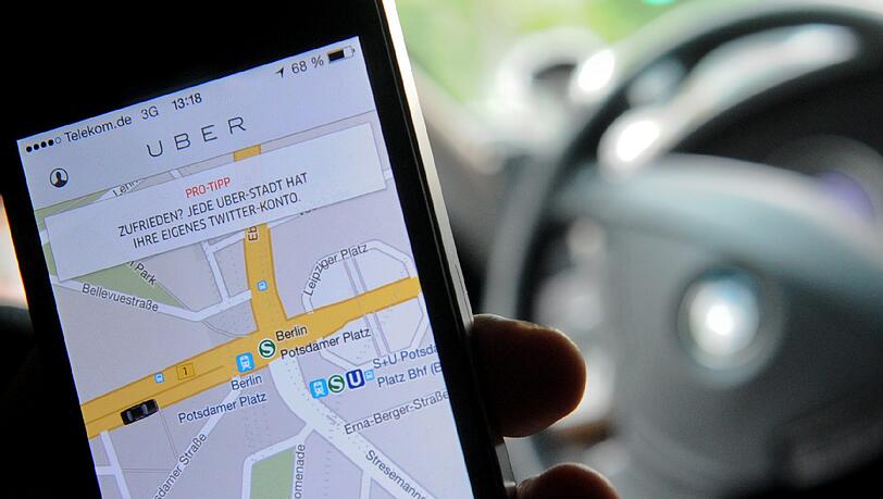 Uber arbeitet nach Angaben der "Financial Times" an eigenen digitalen Landkarten. Foto: Britta Pedersen/Archiv Uber arbeitet nach Angaben der "Financial Times" an eigenen digitalen Landkarten. Foto: Britta Pedersen/Archiv