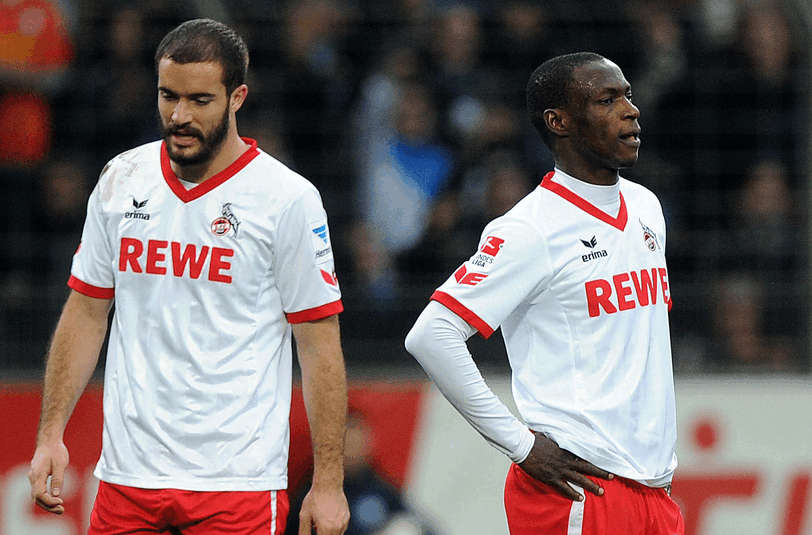 Kölns Roman Golobart (l) und Anthony Ujah sind entäuscht: Der 1.FC Köln erlitt am sonntag seine erste Saison-Niederlage.
