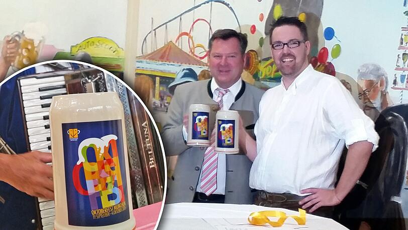 Wiesn-Chef Josef Schmid (l.) und Kabarettist André Hartmann mit dem neuen Wiesn-Krug. Wiesn-Chef Josef Schmid (l.) und Kabarettist André Hartmann mit dem neuen Wiesn-Krug.