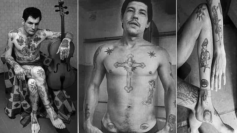 Die Tattoos sagen, wer was auf dem Kerbholz hat. Rechts die Fußfessel, in der Mitte sieht man den Stern.