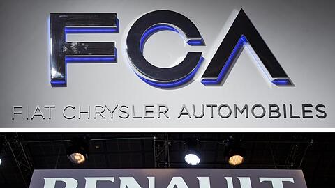 Die Firmenschriftzüge der Autokonzerne Fiat Chrysler und Renault.