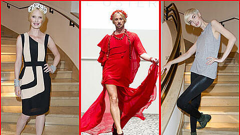 Rote Robe und Blumenkranz im blonden Haar: Bei seiner Modenschau zeigt der junge Münchner Designer Marcel Ostertag seine Kreationen - und präsentiert sie als Model gleich selbst. Prominente Gäste sind Mirja Du Mont und Anika Scheibe.