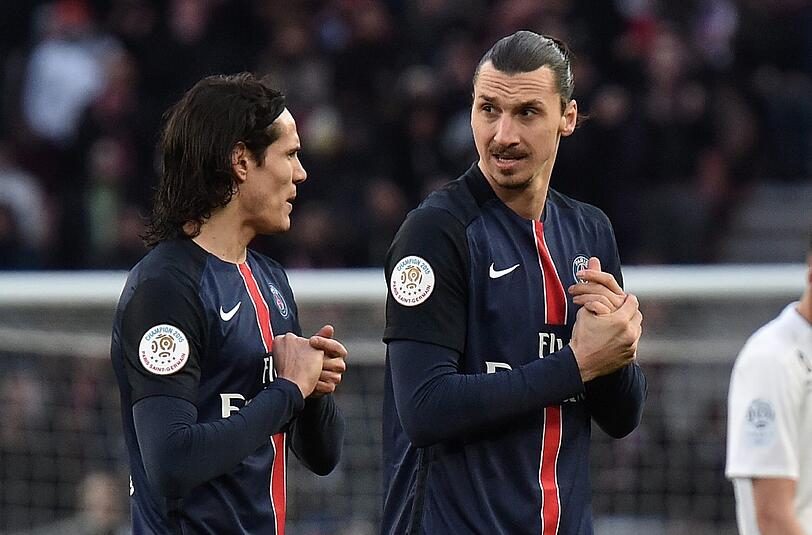 Platz 3: Paris St. Germain - 57 Tore | Zlatan Ibrahimovic (r.; 32 Tore) gilt als das "Enfant terrible" des Weltfußballs. Zusammen mit Edison Cavani (l.; 15 Tore) und Angel Di María (nicht im Bild; 10 Tore) reicht es für Schwedens Superstar und PSG zu Platz 3 in Europa.