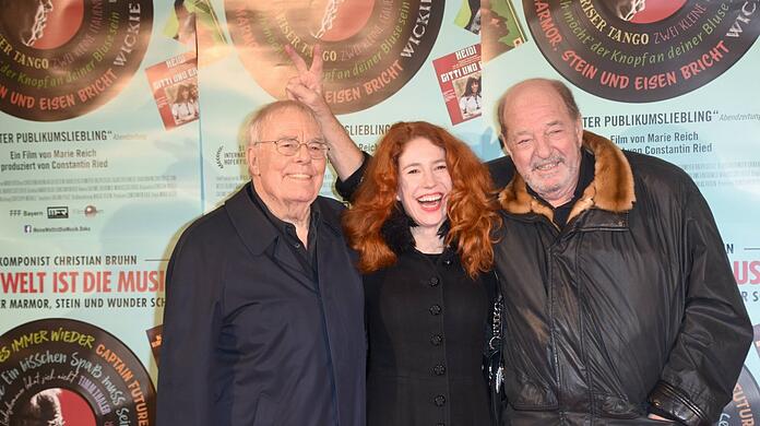 Christian Bruhn mit Laura und Ralph Siegel bei der Premiere des Dokumentarfilms "Meine Welt ist die Musik"  im Januar 2019.