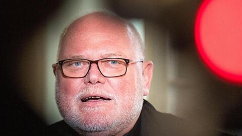 Kardinal Reinhard Marx hält einen Redebeitrag. Foto: Lino Mirgeler/dpa/Archivbild