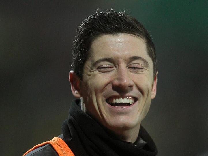 Robert Lewandowski lacht. Foto: Fredrik von Erichsen/dpa/Archivbild