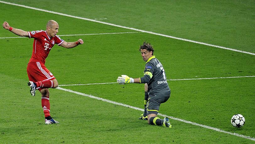 Ein Moment für die Ewigkeit: Arjen Robben überwindet Roman Weidenfeller im Champions-League-Finale 2013 Ein Moment für die Ewigkeit: Arjen Robben überwindet Roman Weidenfeller im Champions-League-Finale 2013