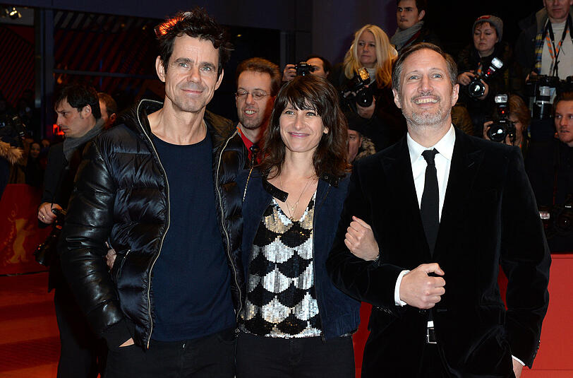 Tom Tykwer (l), Ehefrau Marie Steinmann-Tykwer und Benno Fürmann bei der Berlinale.