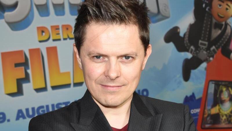 Der Musiker Michael Patrick Kelly lächelt bei seiner Filmpremiere"Playmobil - der Film" im Mathäser Kino. Foto: Ursula Düren Der Musiker Michael Patrick Kelly lächelt bei seiner Filmpremiere"Playmobil - der Film" im Mathäser Kino. Foto: Ursula Düren