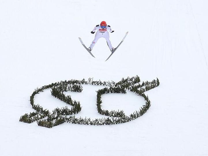 Fabian Riessle aus Deutschland springt beim Wertungssprung. Foto: Karl-Josef Hildenbrand/dpa
