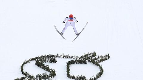 Fabian Riessle aus Deutschland springt beim Wertungssprung. Foto: Karl-Josef Hildenbrand/dpa