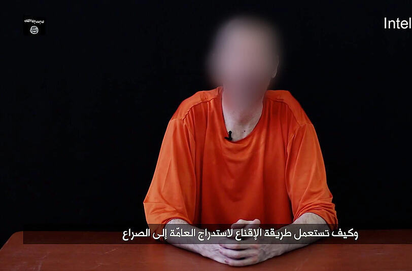 Der britische Fotojournalist John Cantlie muss in dem neuen IS- Video Terror-Propaganda vortragen.