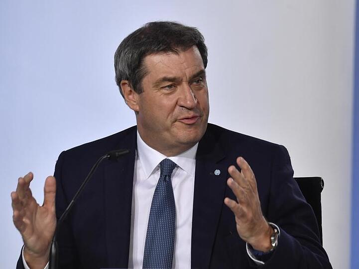 Markus Söder, Ministerpräsident von Bayern, spricht bei einer Pressekonferenz. Foto: John Macdougall/AFP/POOL/dpa