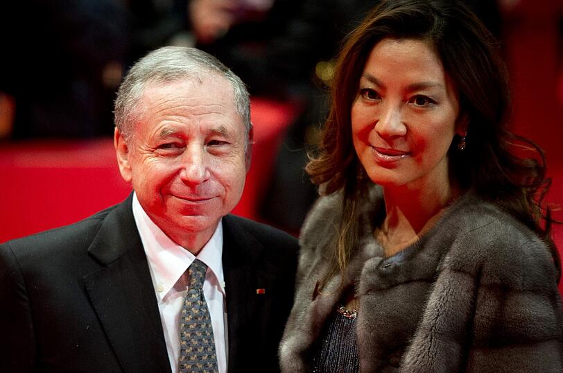 Der Präsident des Welt-Automobilverbands FIA, Jean Todt (l), und seine Lebensgefährtin Michelle Yeoh bei Premiere von "The Monuments Men" während der 64. Internationalen Filmfestspiele.