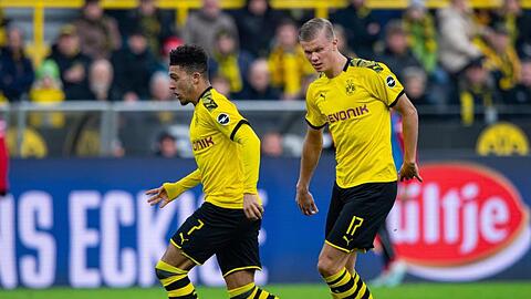 Dortmunds Jadon Sancho (L) und Erling Haaland treffen im Champions-League-Achtelfinale auf Paris Saint Germain.
