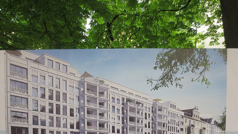 Die Visualisierung, wie die schicken Wohnungen einmal aussehen sollen, ist als Plakat an der Baustelle abgebildet. Die Visualisierung, wie die schicken Wohnungen einmal aussehen sollen, ist als Plakat an der Baustelle abgebildet.